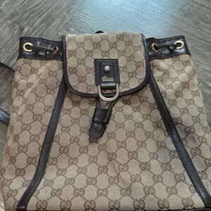 Gucci Abbey Monogram Flap Backpack
